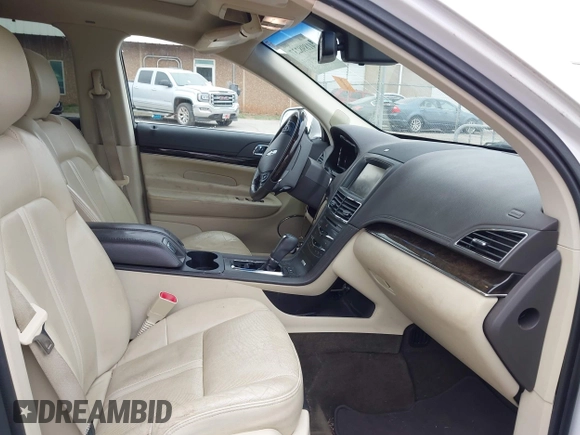 2014 Lincoln MKT EcoBoost with VIN 2LMHJ5AT0EBL50661, listed as a IAAI auction lot 41898237 with 118,770 mi miles and . Bid and sale history available at DreamBid. Image 5.