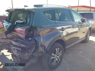2016 Toyota RAV4 LE with VIN JTMBFREV4GJ052168, listed as a IAAI auction lot 41837564 with 73,659 mi miles. Bid and sale history available at carsss.com. Image 4.