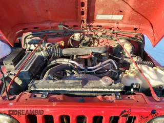 2003 Jeep Wrangler Sport with VIN 1J4FA49S73P301468, listed as a Copart auction lot 87415164 with 127,985 mi miles and Salvage Title. Bid and sale history available at carsss.com. Image 11.