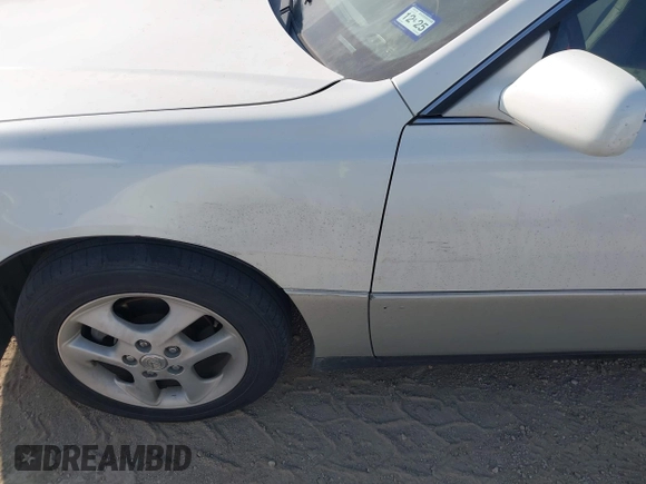 2001 Lexus ES 300 z VIN JT8BF28G510336683, wystawiony jako IAAI lot #42219124 z przebiegiem 189 864 mil mil oraz . Historia ofert i sprzedaży dostępna na DreamBid. Obrazek 6.