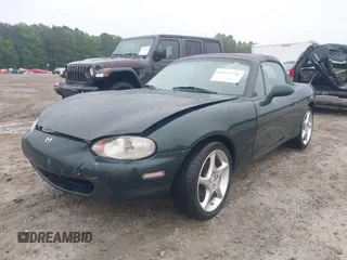 1999 Mazda MX-5 Miata with VIN JM1NB3539X0123231, listed as a IAAI auction lot 42314156 with 154,755 mi miles and . Bid and sale history available at DreamBid. Image 19.