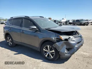 2018 Toyota RAV4 XLE with VIN JTMWFREV3JJ729302, listed as a Copart auction lot 49823765 with 100,576 mi miles and Salvage Title. Bid and sale history available at DreamBid. Image 4.