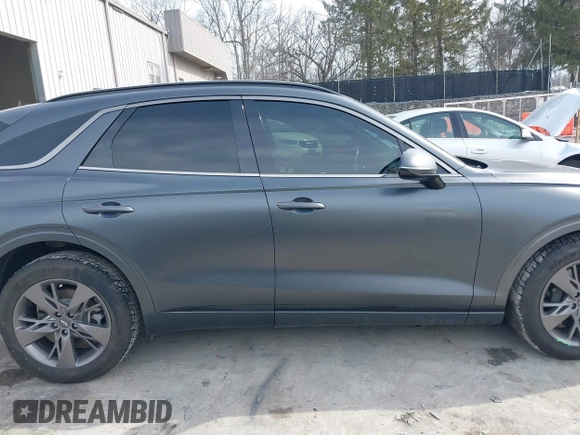 2022 Genesis GV70 Sport with VIN KMUMCDTC6NU028274, listed as a IAAI auction lot 41613720 with 46,522 mi miles and . Bid and sale history available at DreamBid. Image 13.