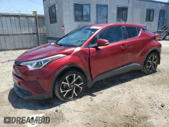 2018 Toyota C-HR XLE with VIN NMTKHMBX7JR011965, listed as a Copart auction lot 56213215 with 147,243 mi miles and Salvage Title. Bid and sale history available at DreamBid. Image 1.