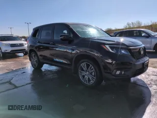2020 Honda Passport EX-L z VIN 5FNYF8H54LB012271, wystawiony jako Copart lot #54915205 z przebiegiem 48 928 mil mil oraz Szkoda całkowita • Salvage title. Historia ofert i sprzedaży dostępna na DreamBid. Obrazek 14.