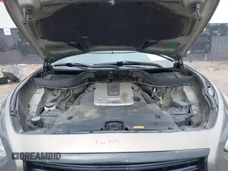 2014 Infiniti QX70 z VIN JN8CS1MU3EM451745, wystawiony jako IAAI lot #42203922 z przebiegiem 144 990 mil mil oraz . Historia ofert i sprzedaży dostępna na DreamBid. Obrazek 10.