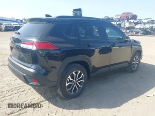 2025 Toyota Corolla Cross Hybrid S with VIN 7MUFBABG6SV066112, listed as a IAAI auction lot 42263992 with 1,684 mi miles and . Bid and sale history available at DreamBid. Image 4.