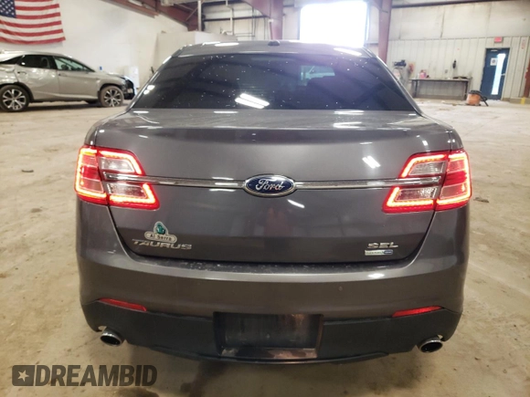 2013 Ford Taurus SEL z VIN 1FAHP2H83DG223446, wystawiony jako Copart lot #53783815 z przebiegiem 122 867 mil mil oraz Czysty tytuł • Clean title. Historia ofert i sprzedaży dostępna na DreamBid. Obrazek 6.