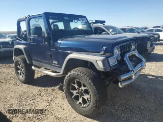 2005 Jeep Wrangler SE with VIN 1J4FA29S65P330905, listed as a Copart auction lot 71633134 with 77,598 mi miles and Salvage Title. Bid and sale history available at carsss.com. Image 4.