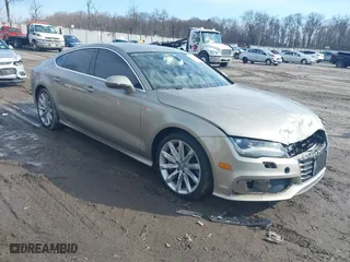 2012 Audi A7 3.0 Prestige with VIN WAU2GAFC0CN134913, listed as a IAAI auction lot 41472294 with 149,844 mi miles. Bid and sale history available at carsss.com. Image 1.
