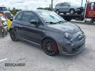 2015 FIAT 500 Abarth z VIN 3C3CFFFH0FT608015, wystawiony jako IAAI lot #42251760 z przebiegiem 102 545 mil mil oraz . Historia ofert i sprzedaży dostępna na DreamBid. Obrazek 1.