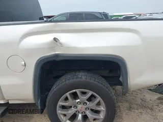 2015 GMC Sierra 1500 SLT with VIN 3GTU2VEC5FG430011, listed as a IAAI auction lot 41951399 with 277,582 mi miles and . Bid and sale history available at DreamBid. Image 21.