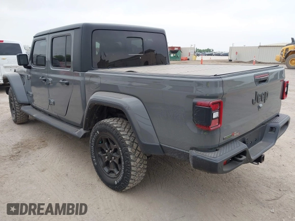 2022 Jeep Gladiator Willys with VIN 1C6JJTAMXNL137237, listed as a IAAI auction lot 41947651 with 55,199 mi miles and . Bid and sale history available at DreamBid. Image 3.