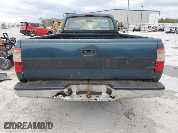 1994 Toyota T100 DX with VIN JT4VD10A6R0017701, listed as a Copart auction lot 46034975 with 219,651 mi miles and Salvage Title. Bid and sale history available at DreamBid. Image 6.