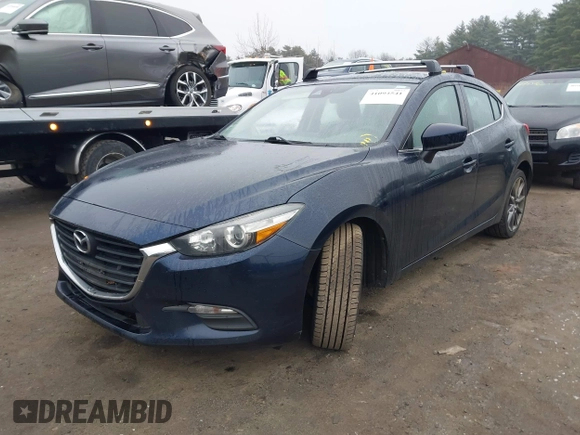 2018 Mazda 3 Touring with VIN 3MZBN1L34JM204883, listed as a IAAI auction lot 41094541 with 125,205 mi miles and . Bid and sale history available at DreamBid. Image 18.