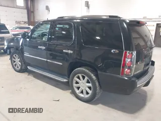 2013 GMC Yukon Denali with VIN 1GKS2EEF0DR105804, listed as a IAAI auction lot 42028402 with 121,054 mi miles. Bid and sale history available at carsss.com. Image 3.