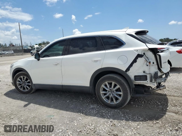 2019 Mazda CX-9 Touring with VIN JM3TCACY7K0327632, listed as a Copart auction lot 60798635 with 63,087 mi miles and Salvage title. Bid and sale history available at DreamBid. Image 2.