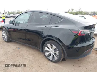 2023 Tesla Model Y Long Range with VIN 7SAYGDEEXPA044335, listed as a IAAI auction lot 42350159 with 26,731 mi miles and . Bid and sale history available at DreamBid. Image 3.