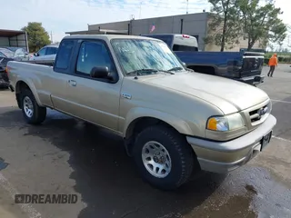 2002 Mazda B-Series 2WD Truck DS with VIN 4F4YR16U52TM18118, listed as a IAAI auction lot 41563022 with 126,136 mi miles. Bid and sale history available at carsss.com. Image 1.