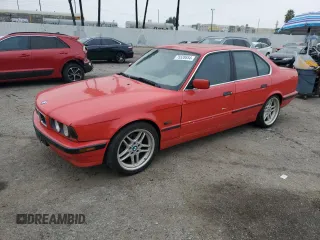 1995 BMW 5 Series with VIN WBAHE5320SGA64595, listed as a Copart auction lot 75528654 with 175,703 mi miles and Clean title. Bid and sale history available at DreamBid. Image 1.
