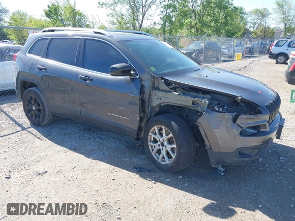2016 Jeep Cherokee Latitude z VIN 1C4PJLCB5GW264607, wystawiony jako IAAI lot #42275637 z przebiegiem 64 264 mil mil oraz . Historia ofert i sprzedaży dostępna na DreamBid. Obrazek 1.