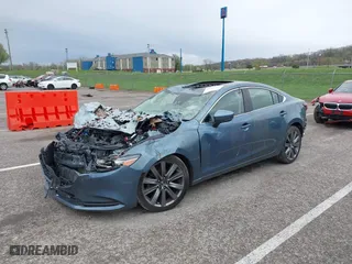 2018 Mazda Mazda6 Grand Touring with VIN JM1GL1TY7J1326256, listed as a IAAI auction lot 41924311 with 99,057 mi miles. Bid and sale history available at carsss.com. Image 2.