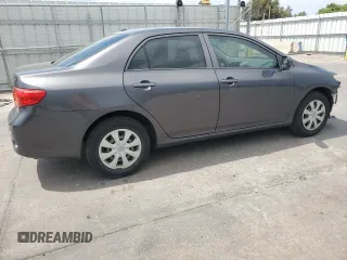 2010 Toyota Corolla with VIN JTDBU4EE6AJ081607, listed as a Copart auction lot 61097275 with 129,131 mi miles and Salvage title. Bid and sale history available at DreamBid. Image 3.
