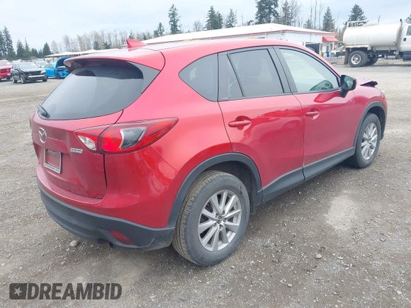 2016 Mazda CX-5 Touring with VIN JM3KE4CY2G0894930, listed as a IAAI auction lot 41906809 with 123,125 mi miles. Bid and sale history available at carsss.com. Image 4.