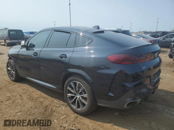 2021 BMW X6 M50i with VIN 5UXCY8C04M9E36899, listed as a Copart auction lot 68819334 with 72,808 mi miles and Salvage Title. Bid and sale history available at carsss.com. Image 2.