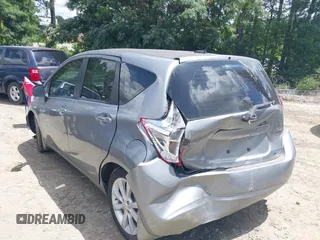 2014 Nissan Note S Plus z VIN 3N1CE2CP3EL351811, wystawiony jako IAAI lot #42528211 z przebiegiem 104 608 mil mil oraz . Historia ofert i sprzedaży dostępna na DreamBid. Obrazek 3.