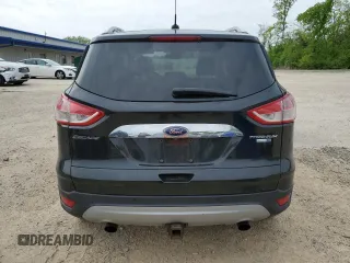 2015 Ford Escape Titanium z VIN 1FMCU9J99FUA90281, wystawiony jako Copart lot #59972565 z przebiegiem 125 351 mil mil oraz Czysty tytuł • Clean title. Historia ofert i sprzedaży dostępna na DreamBid. Obrazek 6.