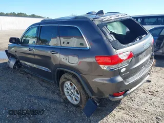 2018 Jeep Grand Cherokee Laredo E with VIN 1C4RJFAG8JC335459, listed as a IAAI auction lot 41850163 with 93,289 mi miles. Bid and sale history available at carsss.com. Image 3.