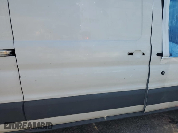 2017 Ford Transit Cargo z VIN 1FTBW2CM3HKB45373, wystawiony jako Copart lot #63834005 z przebiegiem 52 155 mil mil oraz Szkoda całkowita • Salvage title. Historia ofert i sprzedaży dostępna na DreamBid. Obrazek 11.