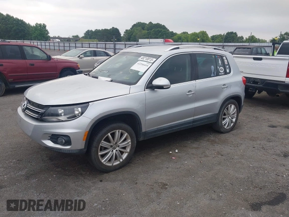 2012 Volkswagen Tiguan SE z VIN WVGAV7AX4CW520340, wystawiony jako IAAI lot #42294414 z przebiegiem 120 009 mil mil oraz . Historia ofert i sprzedaży dostępna na DreamBid. Obrazek 2.
