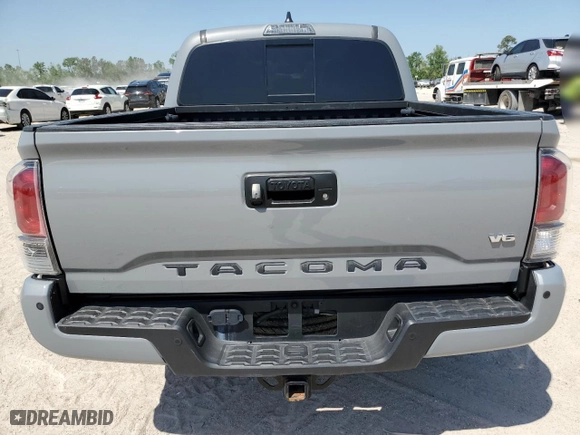 2021 Toyota Tacoma 4WD SR with VIN 3TMCZ5AN2MM436040, listed as a Copart auction lot 52879625 with 27,244 mi miles and Salvage Title. Bid and sale history available at carsss.com. Image 6.