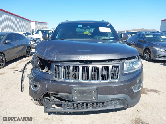 2014 Jeep Grand Cherokee Laredo with VIN 1C4RJEAG4EC317072, listed as a IAAI auction lot 41476862 with 127,742 mi miles. Bid and sale history available at carsss.com. Image 13.
