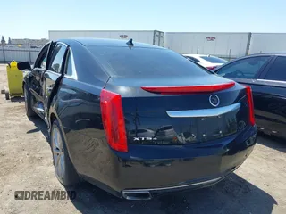 2013 Cadillac XTS Luxury z VIN 2G61R5S32D9226506, wystawiony jako IAAI lot #42208105 z przebiegiem 140 255 mil mil oraz . Historia ofert i sprzedaży dostępna na DreamBid. Obrazek 3.