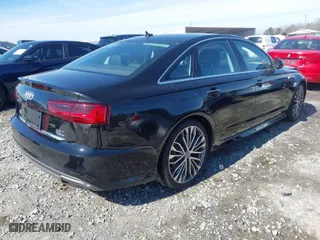 2016 Audi A6 3.0T Premium Plus with VIN WAUFGAFCXGN003236, listed as a IAAI auction lot 41607189 with NaN miles. Bid and sale history available at carsss.com. Image 4.