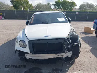 2022 Bentley Bentayga V8 z VIN SJAAM2ZV2NC013035, wystawiony jako IAAI lot #41487773 z przebiegiem 35 500 mil mil oraz . Historia ofert i sprzedaży dostępna na DreamBid. Obrazek 12.