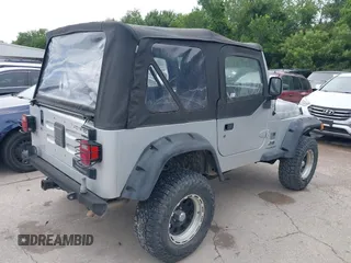 2005 Jeep Wrangler X z VIN 1J4FA39S95P370868, wystawiony jako IAAI lot #42476186 z przebiegiem 144 986 mil mil oraz . Historia ofert i sprzedaży dostępna na DreamBid. Obrazek 4.