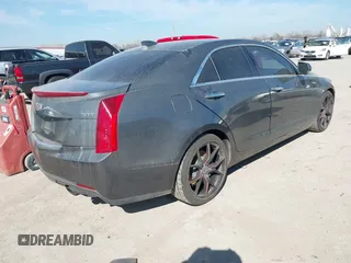 2016 Cadillac ATS Sedan Luxury Collection RWD with VIN 1G6AB5RX1G0103274, listed as a IAAI auction lot 41626772 with 74,795 mi miles. Bid and sale history available at carsss.com. Image 4.