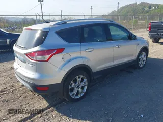 2016 Ford Escape Titanium with VIN 1FMCU9JX2GUA50916, listed as a IAAI auction lot 42118711 with 121,405 mi miles. Bid and sale history available at carsss.com. Image 4.