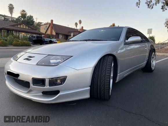1990 Nissan 300ZX z VIN JN1RZ24A6LX013894, wystawiony jako Copart lot #59821625 z przebiegiem 107 310 mil mil oraz Szkoda całkowita • Salvage title. Historia ofert i sprzedaży dostępna na DreamBid. Obrazek 2.