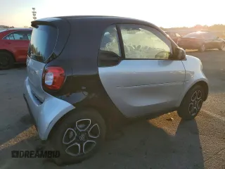 2019 Smart fortwo Pure z VIN WMEFJ9BA0KK368446, wystawiony jako Copart lot #85898494 z przebiegiem Nie podano mil oraz Tytuł czysty. Historia ofert i sprzedaży dostępna na DreamBid. Obrazek 3.