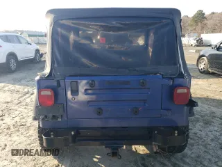 1994 Jeep Wrangler S with VIN 1J4FY19PXRP404320, listed as a Copart auction lot 85633464 with 130,824 mi miles and Salvage Title. Bid and sale history available at carsss.com. Image 6.