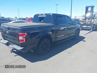 2019 Ford F-150 XL with VIN 1FTEW1CP9KKD28429, listed as a IAAI auction lot 41397905 with 96,793 mi miles and . Bid and sale history available at carsss.com. Image 4.