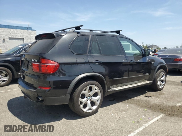 2012 BMW X5 35i z VIN 5UXZV4C51CL744313, wystawiony jako Copart lot #58270755 z przebiegiem 97 903 mil mil oraz Szkoda całkowita • Salvage title. Historia ofert i sprzedaży dostępna na DreamBid. Obrazek 3.
