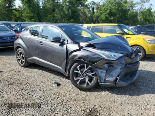 2021 Toyota C-HR LE z VIN NMTKHMBX1MR121205, wystawiony jako Copart lot #52317525 z przebiegiem 73 654 mil mil oraz Nie do naprawy. Historia ofert i sprzedaży dostępna na DreamBid. Obrazek 4.