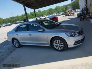 2016 Volkswagen Passat 1.8T S with VIN 1VWAS7A38GC031521, listed as a IAAI auction lot 42069429 with 94,938 mi miles. Bid and sale history available at carsss.com. Image 13.