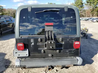 2002 Jeep Wrangler Sahara with VIN 1J4FA59S42P726814, listed as a Copart auction lot 80045514 with 197,196 mi miles and Clean Title. Bid and sale history available at carsss.com. Image 6.